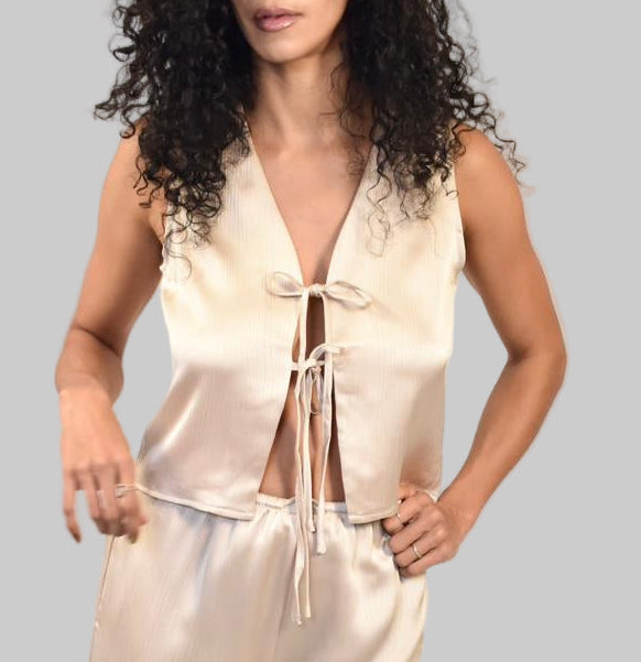 Conjunto tejido de chaleco sin mangas con lazo frontal y pantalón