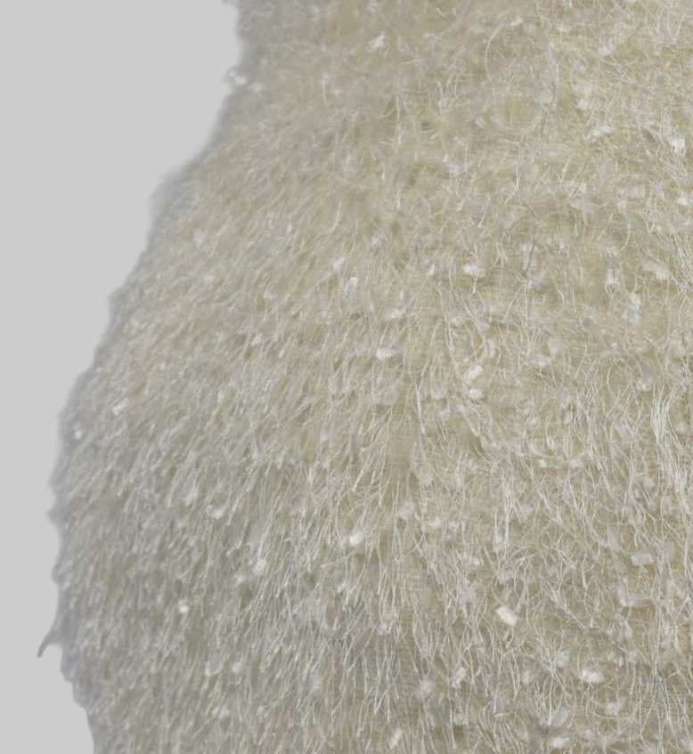 MINIFALDA CON DETALLE DE FLECOS