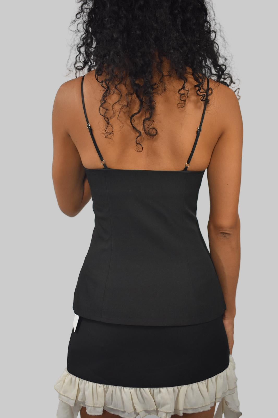 CAMISETA CHALECO CON BOTONES DE TEJIDO SUAVE